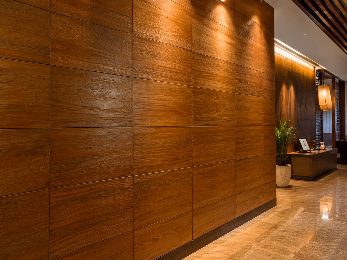 Teak wall paneling installed 20+ years ago in a commercial interior space