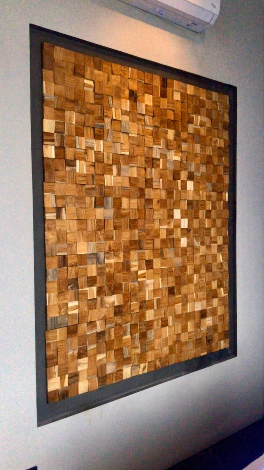 Teak wall panels installed in luxury bathroom with natural wood texture and spa-like atmosphere